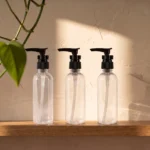 50ml transparent bottle with black pump for lotion serum and hair oil