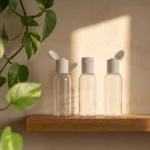50ml transparent bottle with white flip top cap on a bathroom shelf